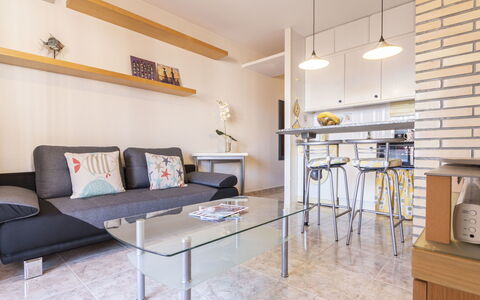Torrepuerto: Table, Furniture, Couch, Shelf, Interior Design, Shelving, Studio Couch, Floor, Flooring, Living Room