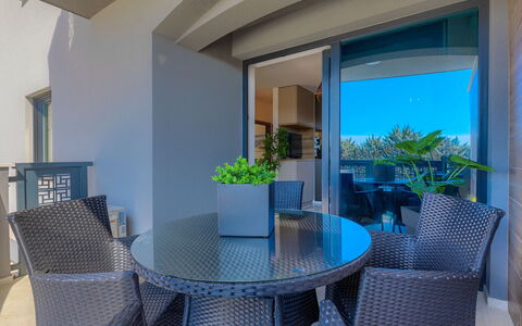 Wing 77: Table, Furniture, Plant, Property, Chair, Houseplant, Building, Flowerpot, Blue, Azure