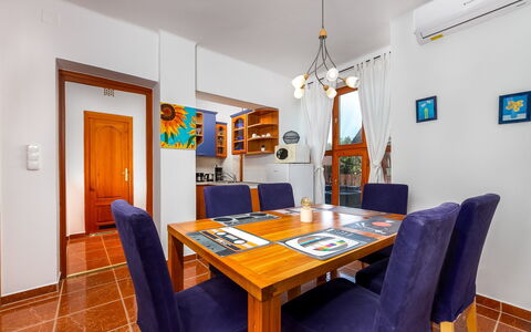 Kamilla: Table, Furniture, Picture Frame, Property, Chair, Orange, Wood, Building, Interior Design, Living Room