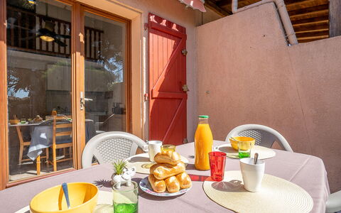 Thalassa: Food, Table, Tableware, Furniture, Property, Dishware, Orange, Building, Plate, Interior Design