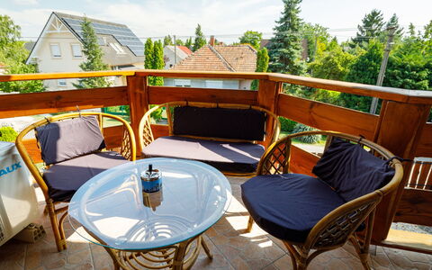 Kaldi: Table, Furniture, Sky, Building, Property, Plant, Cloud, Chair, Tree, Outdoor Table