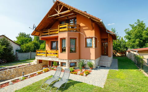 Kaldi: Sky, Plant, Property, Building, Window, House, Tree, Land Lot, Shade, Wood