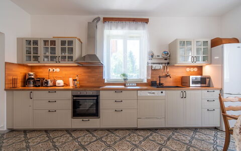 Sudoměřice: Kitchen, Kitchen Appliance, Cabinetry, Countertop, Furniture, Major Appliance, Interior Design, Flooring, Drawer, Wood