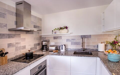 Villa El Camino: Countertop, Cabinetry, Kitchen, Sink, Kitchen Appliance, Kitchen Stove, Home Appliance, Building, Interior Design, Exhaust Hood