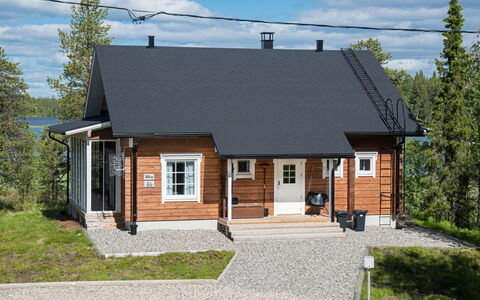 Villa Tunturisopuli: Furniture, Chair, Outdoor Furniture, Table, Wood, Outdoor Table, Kitchen & Dining Room Table, Shade, Garden, Umbrella