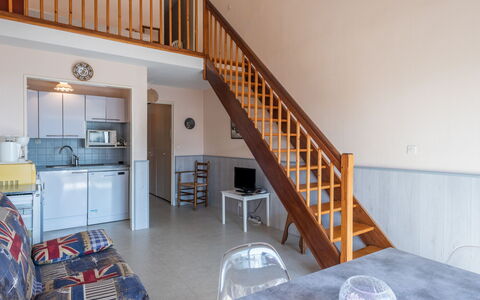 Résidence les Dunes: Furniture, Property, Cabinetry, Table, Building, Wood, Interior Design, Bookcase, Stairs, Flooring