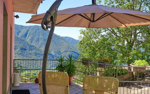 Minú: Sky, Mountain, Plant, Plant Community, Tree, Natural Environment, Larch, Natural Landscape, Highland, Slope