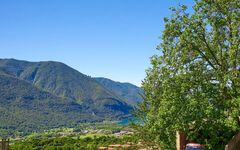 Minú: Sky, Mountain, Plant, Plant Community, Tree, Natural Environment, Larch, Natural Landscape, Highland, Slope