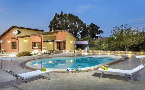 Flavia: Water, Sky, Plant, Swimming Pool, Building, Azure, Shade, Window, Sunlounger, Tree
