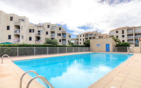 Les Frégates: Water, Cloud, Sky, Building, Property, Swimming Pool, Window, Plant, Azure, Tree