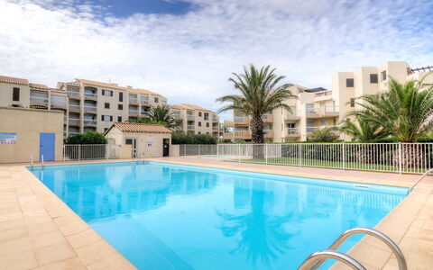 Les Frégates: Water, Cloud, Plant, Sky, Building, Property, Swimming Pool, Tree, Azure, Window