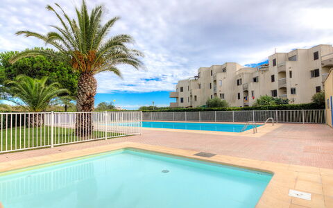 Les Frégates: Water, Cloud, Sky, Property, Building, Plant, Swimming Pool, Azure, Tree, Seaside Resort