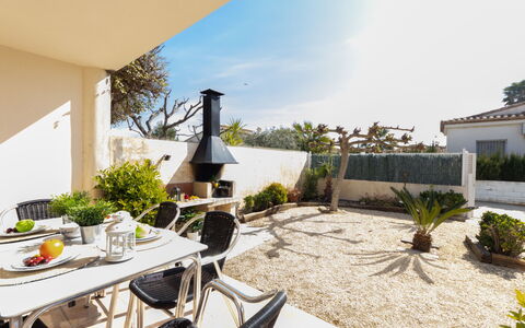 Jenaro: Plant, Sky, Building, Table, Shade, Houseplant, Cloud, Chair, Interior Design, Cottage