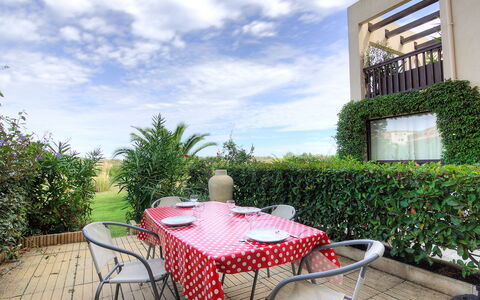 Catalona: Cloud, Plant, Table, Sky, Furniture, Property, Chair, Botany, Outdoor Furniture, Outdoor Table