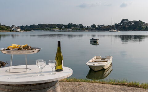 Le Moulin: Water, Cloud, Sky, Boat, Water Resources, Watercraft, Bottle, Lake, Plant, Vehicle