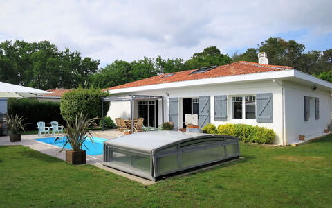 Villa Camélia: Sky, Cloud, Plant, Window, Building, Tree, Shade, Door, Flower, Land Lot