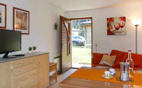 Cà Bias: Furniture, Property, Table, Picture Frame, Cabinetry, Plant, Comfort, Lighting, Houseplant, Wood