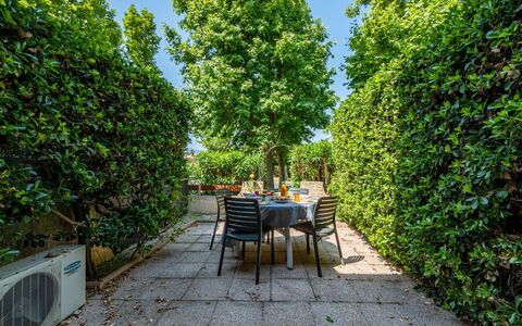 Le Lagon: Plant, Sky, Road Surface, Natural Landscape, Tree, Chair, Outdoor Furniture, Landscape, Road, Shrub
