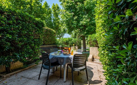 Le Lagon: Plant, Furniture, Plant Community, Table, Chair, Botany, Natural Landscape, Outdoor Furniture, Shade, Tree