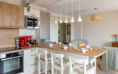 Les Palmiers: Furniture, Property, Table, Cabinetry, Wood, Countertop, Lighting, Interior Design, Flooring, Floor