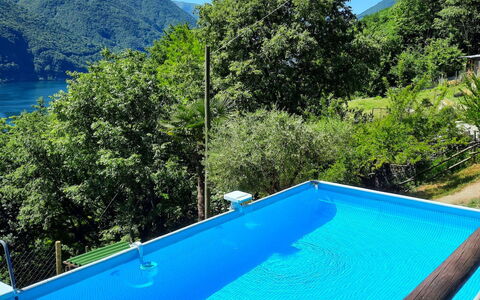 Porlezza 84: Water, Sky, Water Resources, Property, Swimming Pool, Blue, Azure, Shade, Natural Landscape, Rectangle