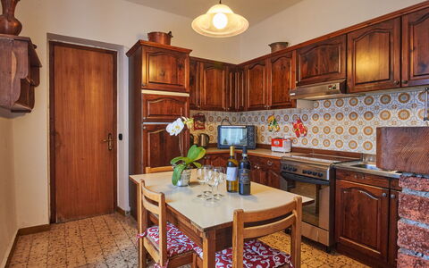 Porlezza 84: Cabinetry, Furniture, Property, Countertop, Table, Chair, Wood, Drawer, Interior Design, Kitchen