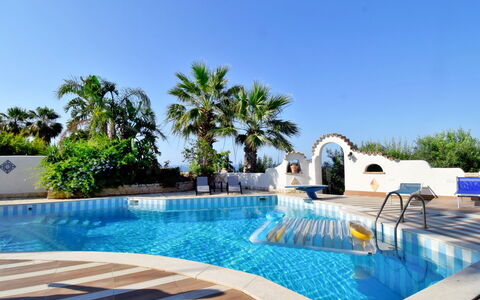 Le Palme: Water, Sky, Property, Swimming Pool, Azure, Plant, Tree, Shade, Outdoor Furniture, Leisure