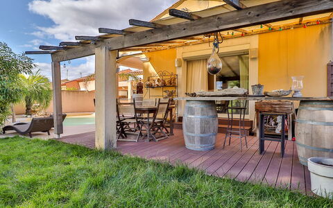 La Pinède: Plant, Building, Sky, Property, Furniture, Table, Cloud, Wood, Door, Interior Design