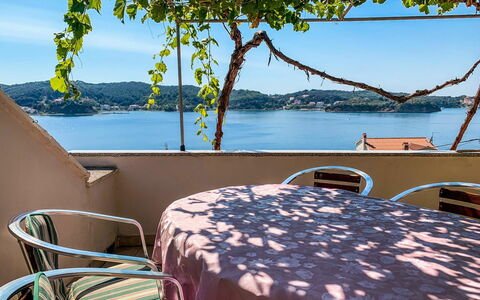 Rab Supetarska Draga 101: Water, Sky, Plant, Furniture, Property, Table, Azure, Tree, Shade, Outdoor Furniture