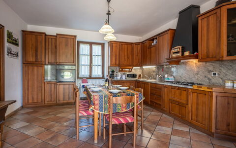 Cascina Anna: Furniture, Cabinetry, Table, Countertop, Wood, Lighting, Chair, Kitchen, Picture Frame, Interior Design