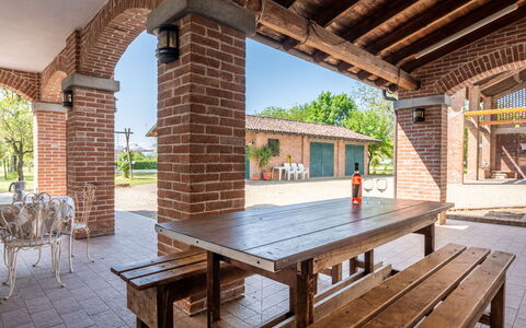 Cascina Anna: Sky, Property, Furniture, Table, Wood, Plant, Building, Lighting, Shade, Interior Design