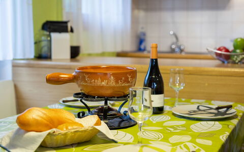 Alicia: Food, Table, Tableware, Bottle, Drinkware, Cabinetry, Orange