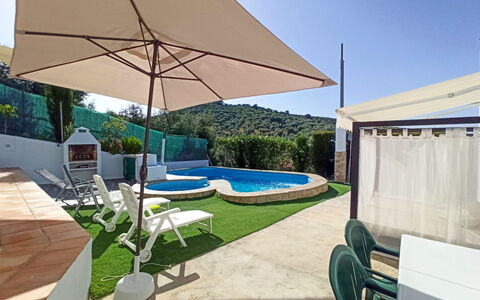 El Viso: Plant, Building, Shade, Sky, Outdoor Furniture, Sunlounger, Swimming Pool, Interior Design, Table, Umbrella
