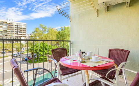 Oromar: Table, Furniture, Sky, Property, Cloud, Building, Chair, Tableware, Lighting, Interior Design