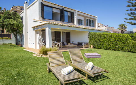 Maison del Mar: Plant, Sky, Building, Property, Window, Outdoor Bench, Tree, Porch, House, Outdoor Furniture