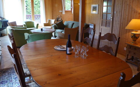 Le Jet D'Eau 19: Table, Furniture, Property, Window, Chair, Wood, Couch, Bottle, Building, Lighting