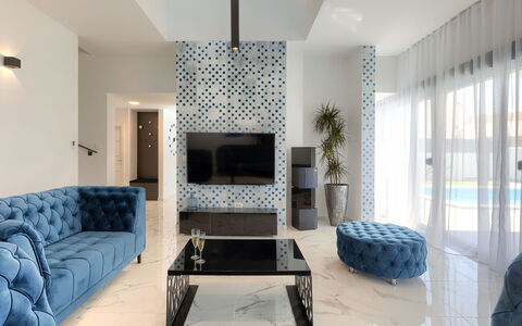 Dots N' Stripes: Furniture, Blue, Building, Interior Design, Comfort, Wood, Flooring, Floor, Living Room, Table
