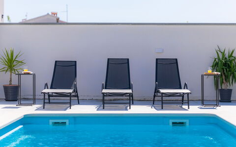 Laura: Water, Plant, Property, Furniture, Swimming Pool, Blue, Flowerpot, Azure, Green, Rectangle