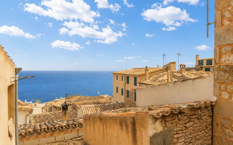 Boutique House: Blue, Horizon, Sea, Residential Area, Architecture, Coast, Home, Human Settlement, Coastal And Oceanic Landforms, Ocean