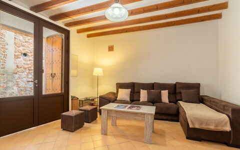Boutique House: Couch, Property, Table, Furniture, Wood, Comfort, Lighting, Interior Design, Ceiling Fan, Floor