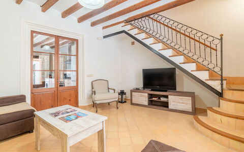 Boutique House: Couch, Furniture, Table, Wood, Interior Design, Television, Window, Building, Flooring, Floor