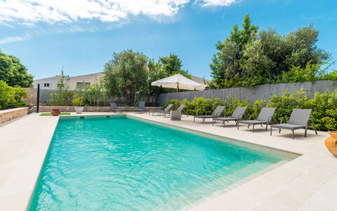 Can Rochet: Cloud, Water, Sky, Plant, Swimming Pool, Chair, Tree, Building, Outdoor Furniture, Shade