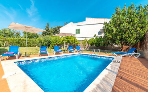Can Delfin Alcudia: Water, Sky, Plant, Building, Property, Swimming Pool, Azure, Shade, Tree, Outdoor Furniture