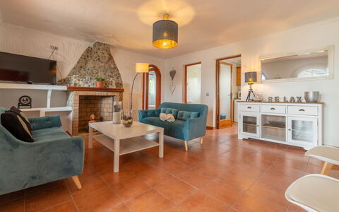 Can Delfin Alcudia: Table, Furniture, Couch, Property, Picture Frame, Living Room, Wood, Lighting, Interior Design, Architecture