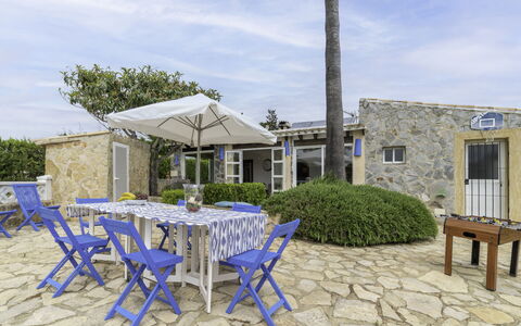 Can Delfin Alcudia: Cloud, Sky, Table, Furniture, Plant, Azure, Chair, Outdoor Table, Outdoor Furniture, Shade