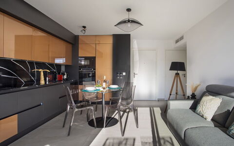 Le Grey Pearl: Furniture, Interior Design, Flooring, Kitchen, Wood, Floor, Ceiling, Countertop, Room, Chair