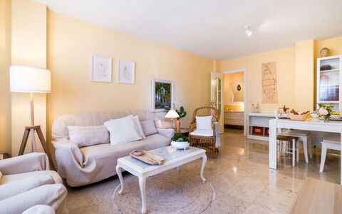 Rincon Dorado: Table, Furniture, Property, Couch, Building, Interior Design, Lighting, Orange, Houseplant, Wood