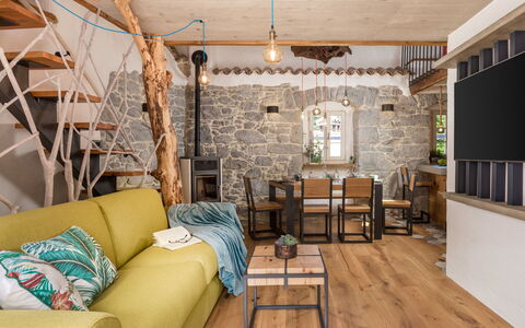 Villa Antonio: Table, Furniture, Building, Couch, Picture Frame, Wood, Interior Design, Flooring, Chair, Living Room