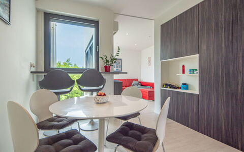 Oliva 2: Table, Furniture, Property, Chair, Interior Design, Window, Architecture, Plant, Wood