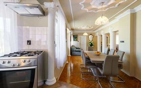 Big Thuja: Furniture, Property, Table, Building, Chair, Gas Stove, Wood, Cooktop, Architecture, Interior Design